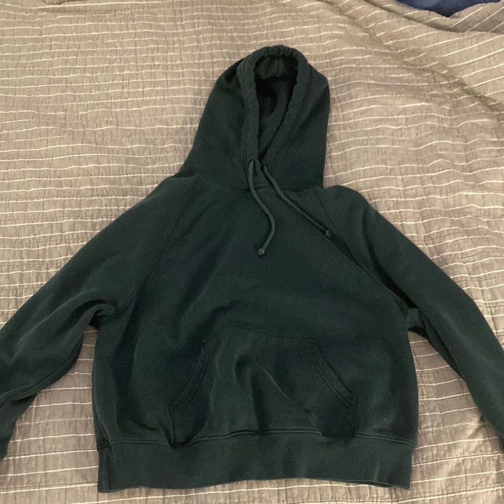This is a dark green sweatshirt